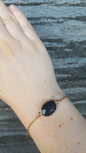 Gold plated oval blue sand stone bracelet