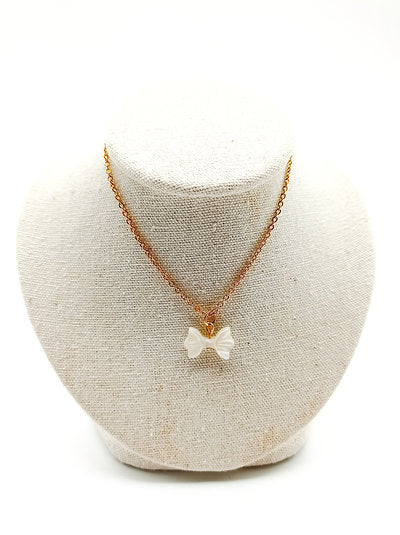 Collier plaqué or et noeud en nacre