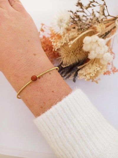 Twisted gold-plated carnelian bangle